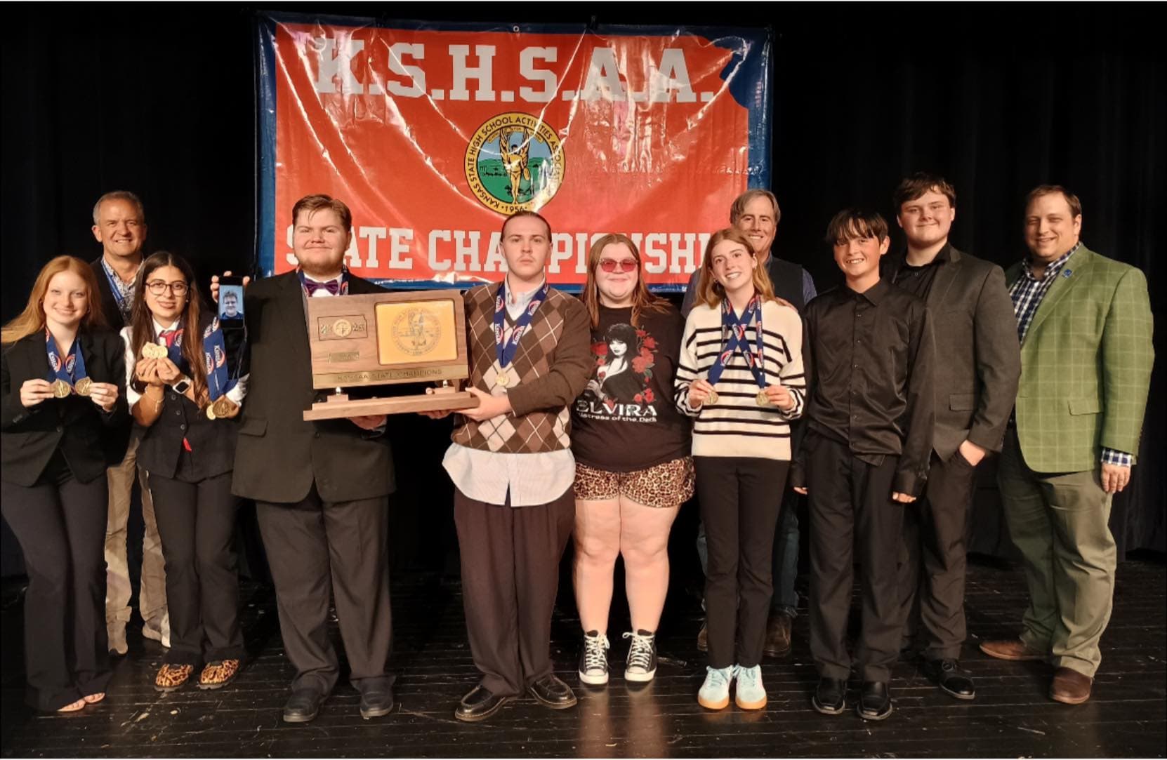Sterling students celebrating a forensics championship